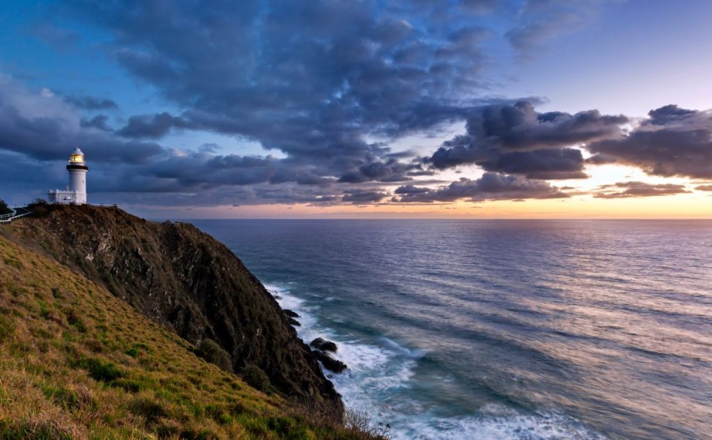 Byron Bay lighthouse, Australia, at sunrise. Pacific Ocean from most easterly point of Australia.