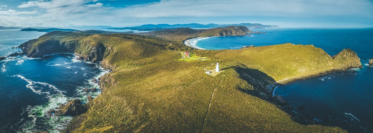 Aerial view of South Bruny National Park and Lighthouse at sunset. Bruny Island, Tasmania, Australia