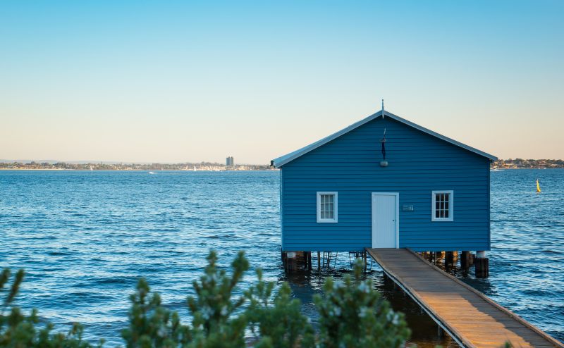 Sunset over the Matilda Bay boathouse in the Swan River in Perth, Western Australia.
