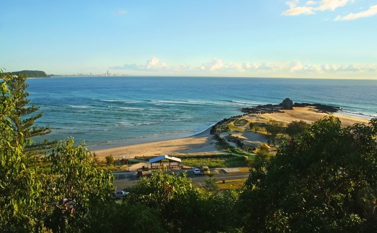 View across Currumbin Creek looking towards Surfers Paradise at sunrise on the Gold Coast 